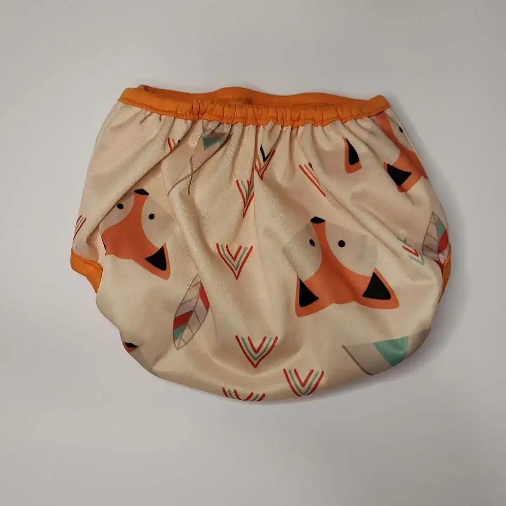 Adjustable Orange-Trim Diaper Cover with Geometric Feather Print